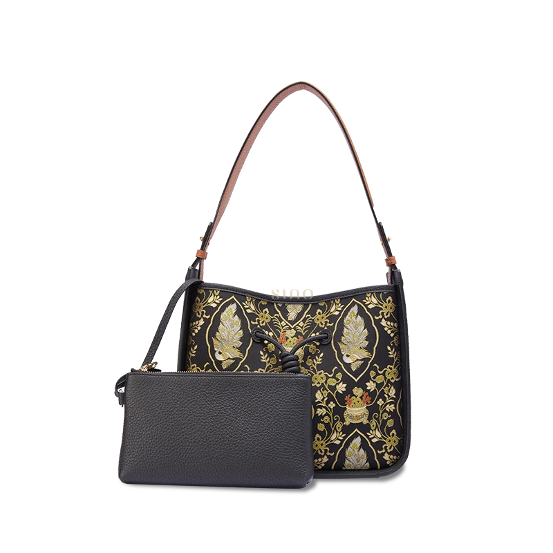 Peacock Prosperity Song Brocade shoulder bag for women with black top-grain leather and matching pouch, front view.
