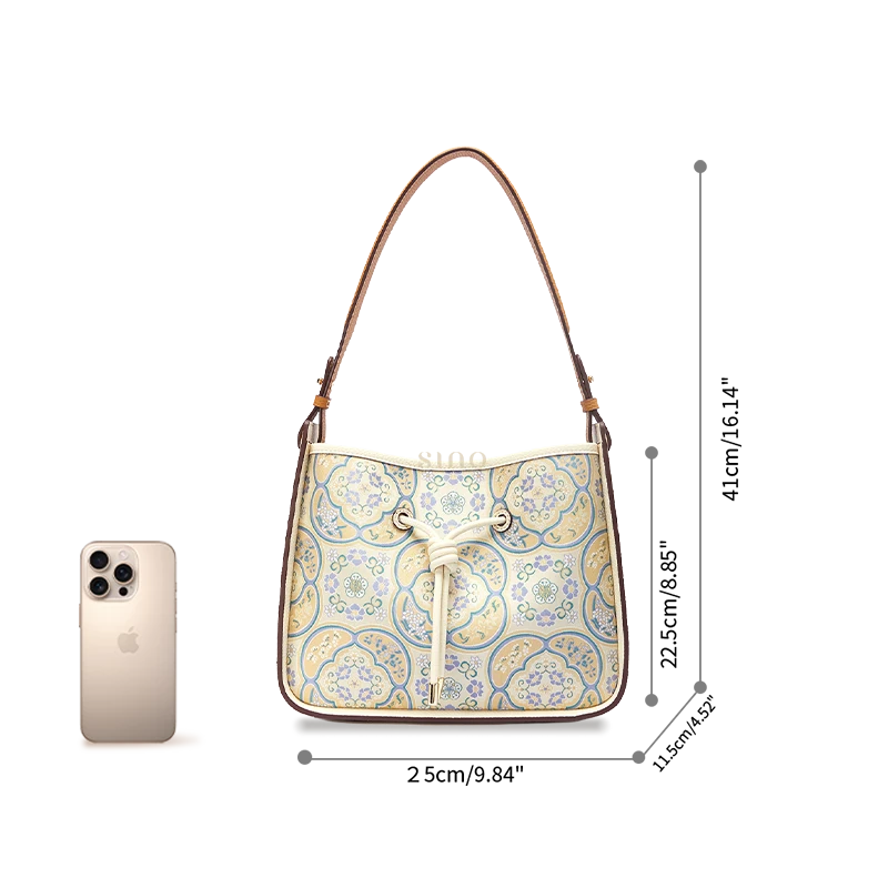Seasonal Grace large shoulder bag size reference shown beside a smartphone for scale.