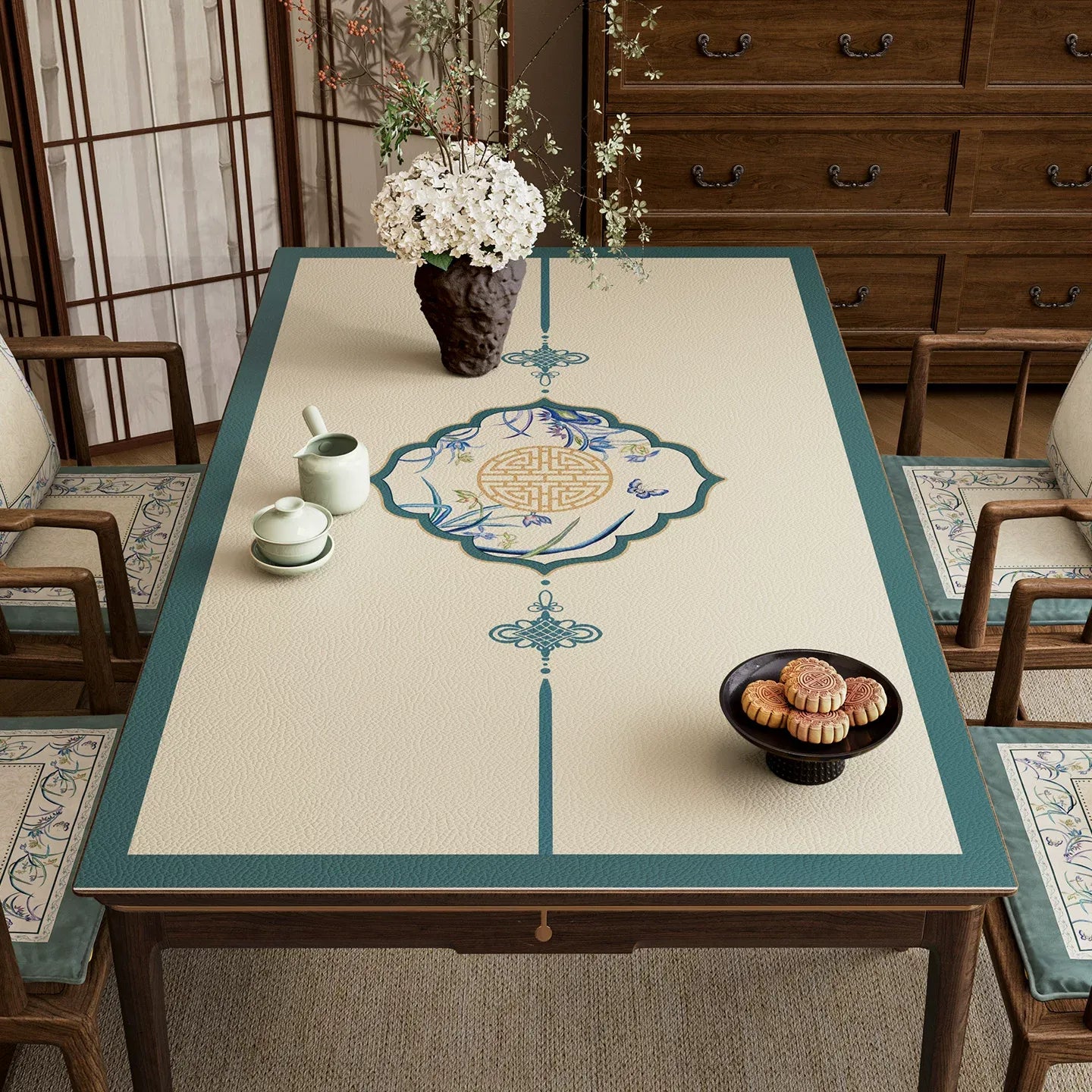 Summer blue leather table mat with Chinoiserie longevity medallion.