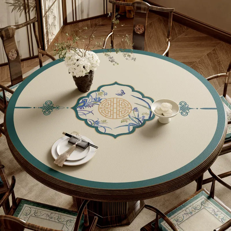 Chinoiserie summer blue round leather table mat with center design.