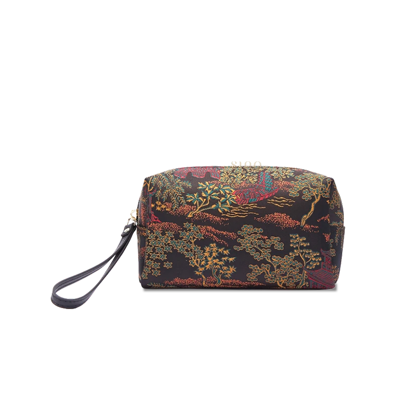 Black Chinoiserie vintage brocade wristlet wallet for women, front view with woven jacquard pattern and wrist strap.