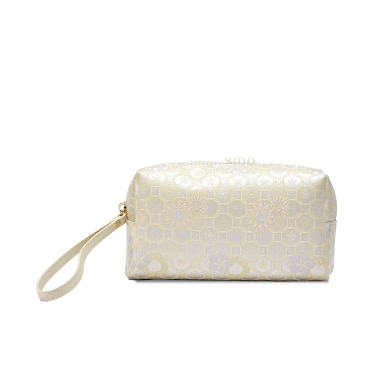 Ivory Chinoiserie vintage wristlet wallet for women, front view with light brocade jacquard pattern and wrist strap.