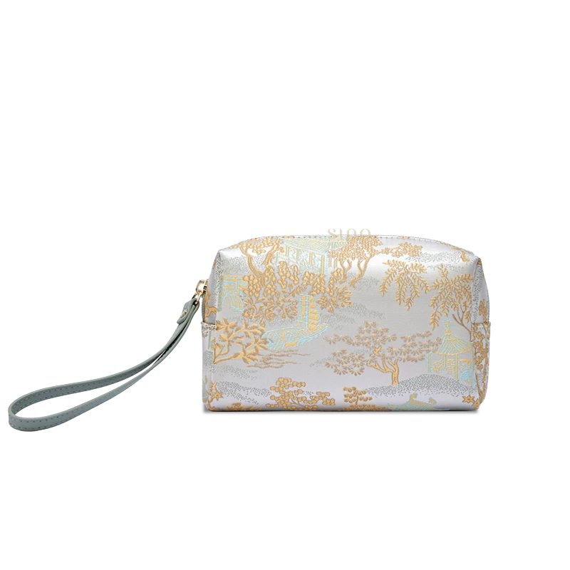 Light gray Chinoiserie brocade wristlet wallet for women, front view with vintage woven jacquard design.