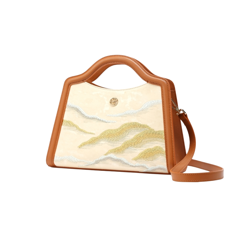 Cloud Mountain embroidery silk and leather top handle bag with structured shape and luxury finish.