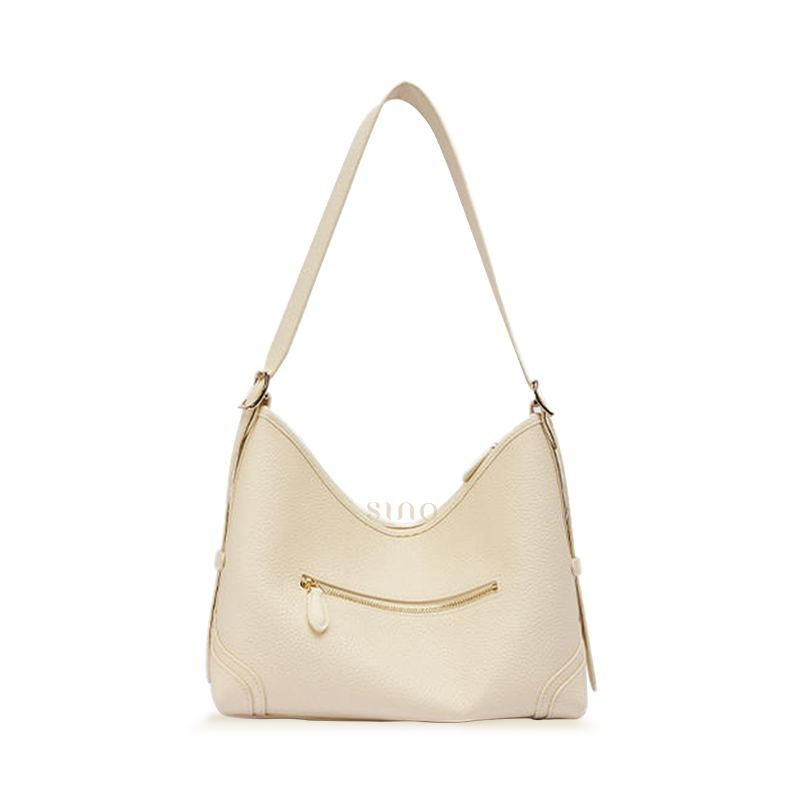 Back view of the Dayun Brocade Verdant Floral Leather Crossbody Bag with cream leather body and rear zipper pocket.