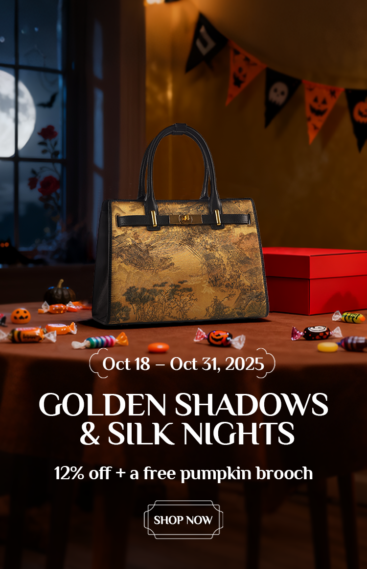 Halloween homepage banner featuring a golden landscape handbag, pumpkins, candles, candy, and a cozy spooky vibe (full moon, bunting).