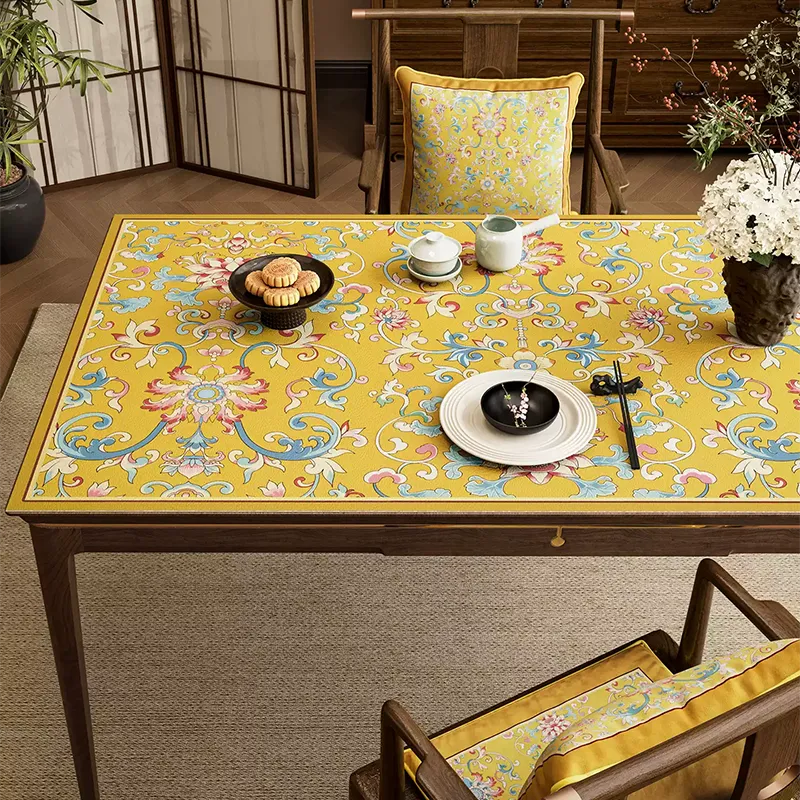 Imperial yellow floral leather table mat left pattern in dining setting.