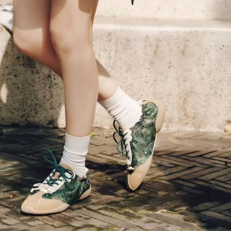 Jade Green Shu Brocade ballet sneakers styled with casual clothing, showcasing modern fashion with traditional Chinese craftsmanship.