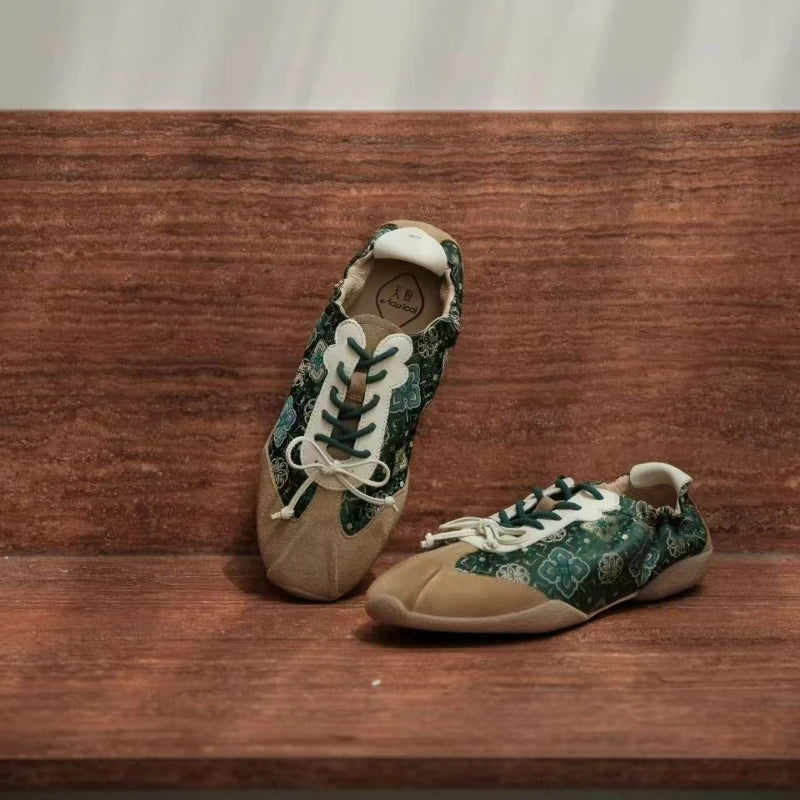 ade Green Shu Brocade Persimmon Motif ballet sneakers displayed in a lifestyle setting, featuring handcrafted textile details and modern design.