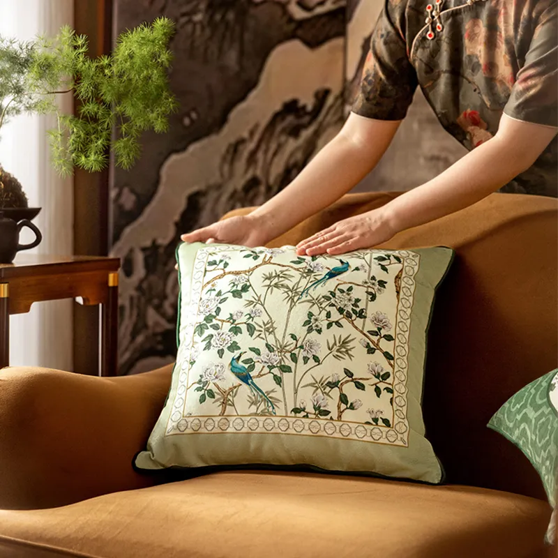 Model styling A style luxury chinoiserie jade green throw pillow for living room.