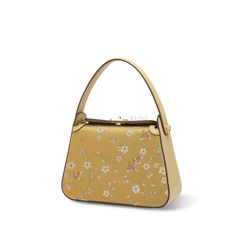 Side view of Luxury Chinoiserie Song Brocade Magpie & Plum Blossom Handbag on white background.