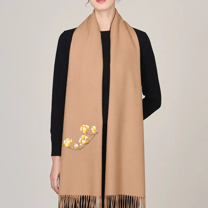 Luxury chinoiserie Suzhou embroidery cashmere scarf in camel, draped on model (main image).