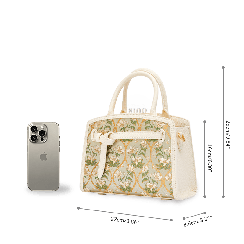 Size reference of the Luxury Dayun Brocade Verdant Floral Large Leather Top Handle Bag beside a smartphone.