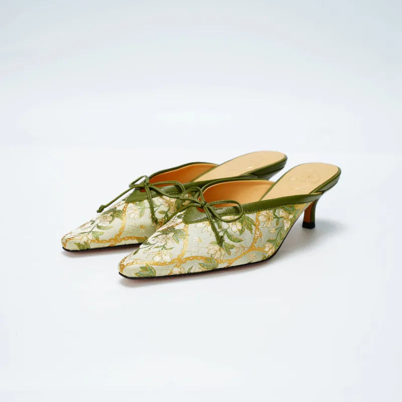 Luxury Dayun Brocade Verdant Floral kitten heel mules featuring pointed toe design and elegant bow detail.