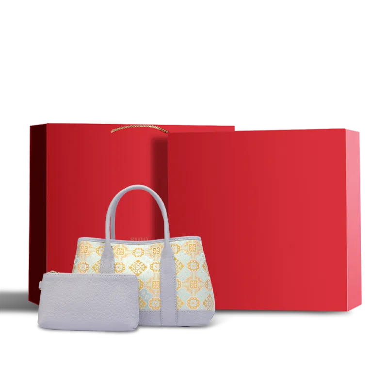 Luxury gold-woven Song brocade Ruyi motif tote bag with red gift box.