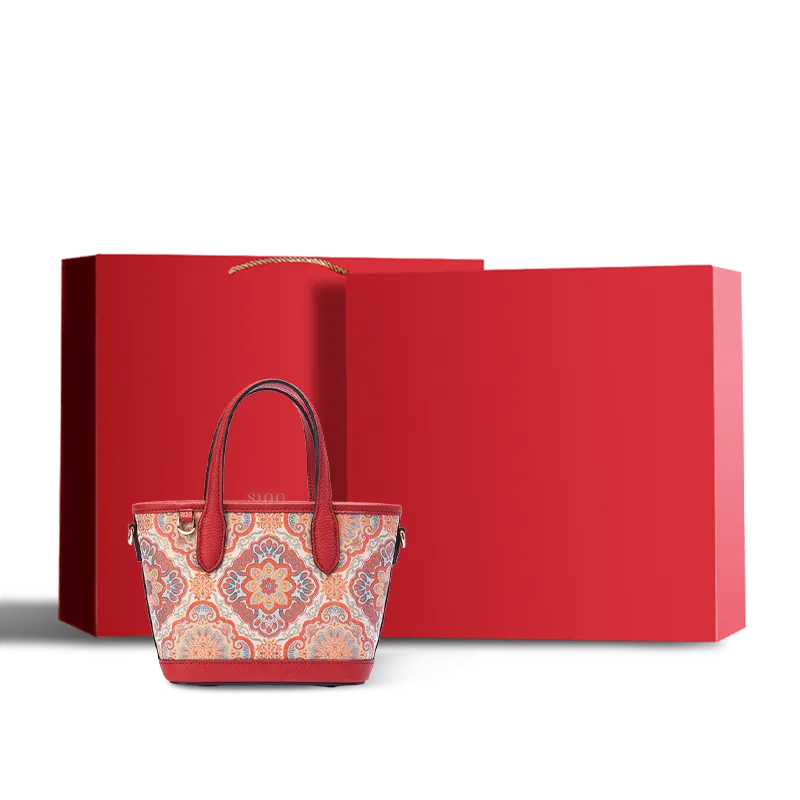 Luxury red Song brocade Baoxiang motif top-handle bag with red gift box.
