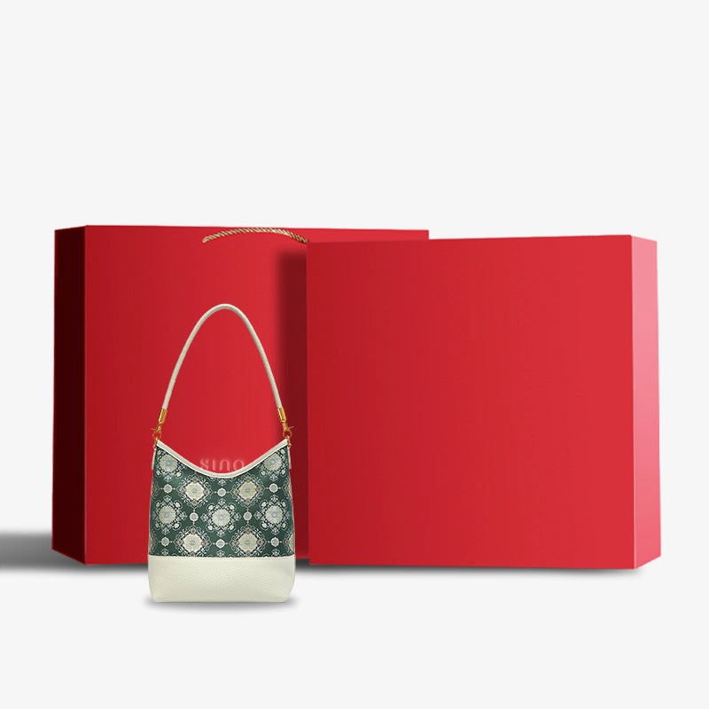 Luxury Emerald Blossom Shu Brocade shoulder bag presented with an elegant red gift box.