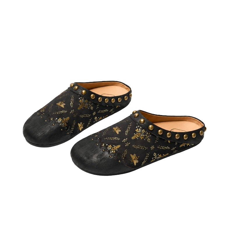 Luxury Shu Brocade Gilded Butterfly mules for women featuring black silk brocade, golden butterfly motifs, gold stud details, and elegant Chinese-inspired craftsmanship.