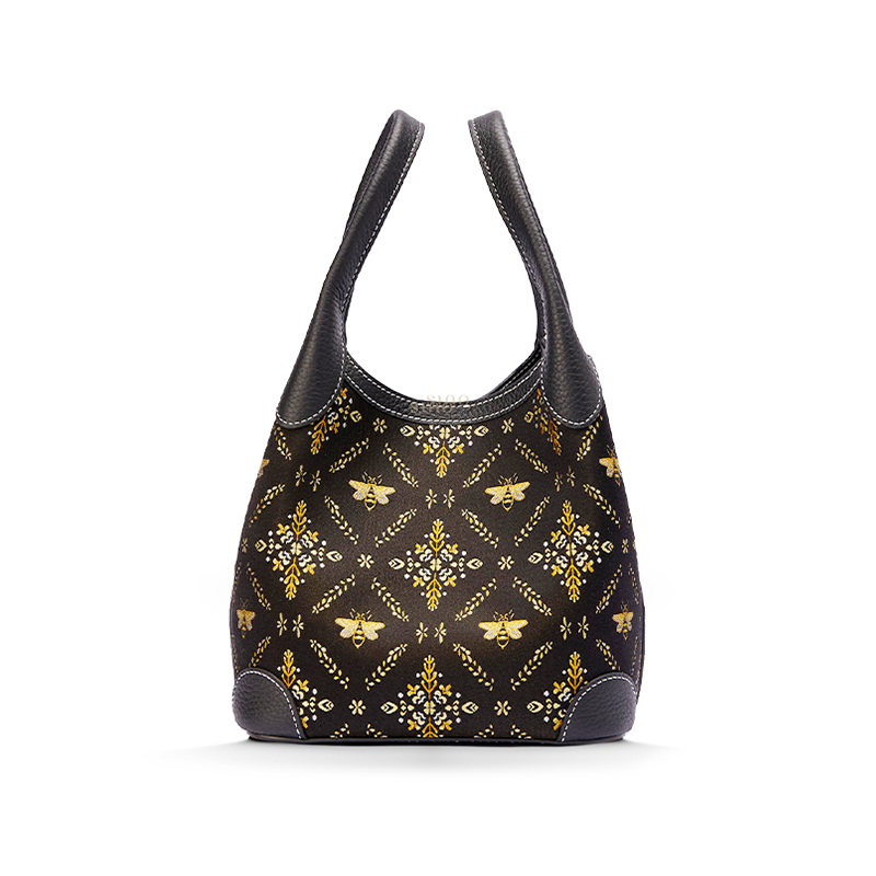 Front view of the Luxury Shu Brocade Gilded Jade Leather Basket Tote Bag, featuring a black brocade body with gilded bee and botanical motif.