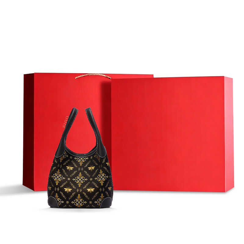 Luxury Shu Brocade Gilded Jade Leather Basket Tote Bag displayed with a red gift box, ideal for premium gifting and elegant retail presentation.