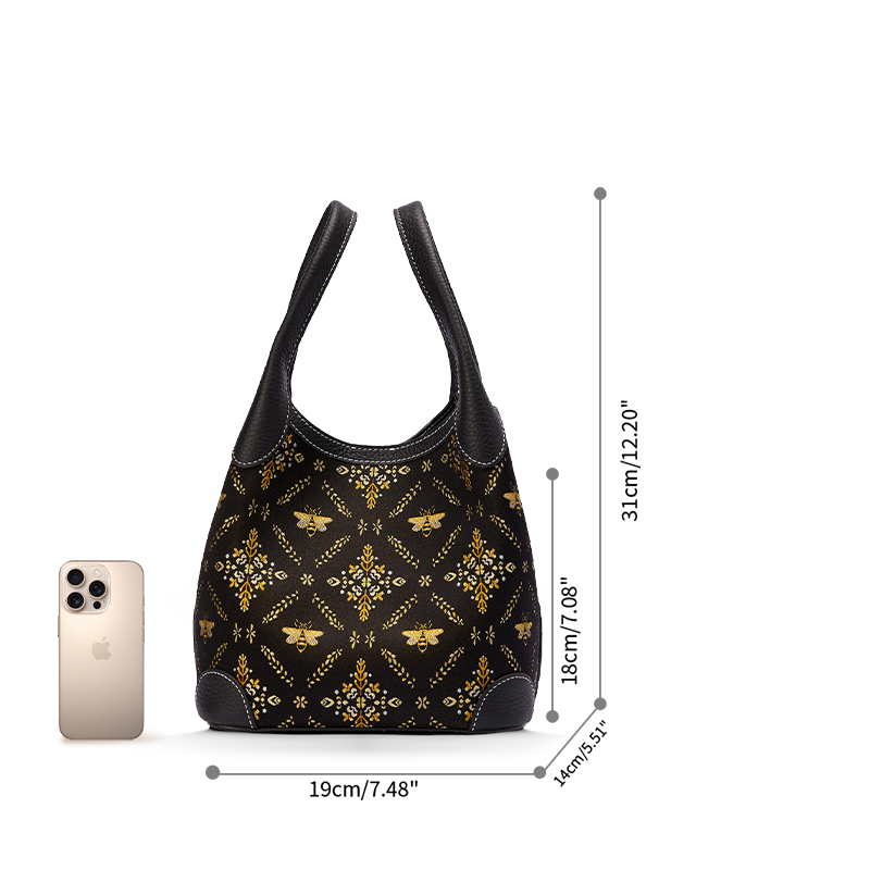 Size reference image of the Luxury Shu Brocade Gilded Jade Leather Basket Tote Bag, shown with a phone for scale and daily capacity.