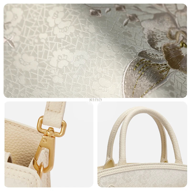 Close-up detail of the Luxury Shuanglin Silk Orchid Butterfly Embroidered Leather Top Handle Bag highlighting the Shuanglin silk texture, embroidery, gold-tone hardware, and top handle.