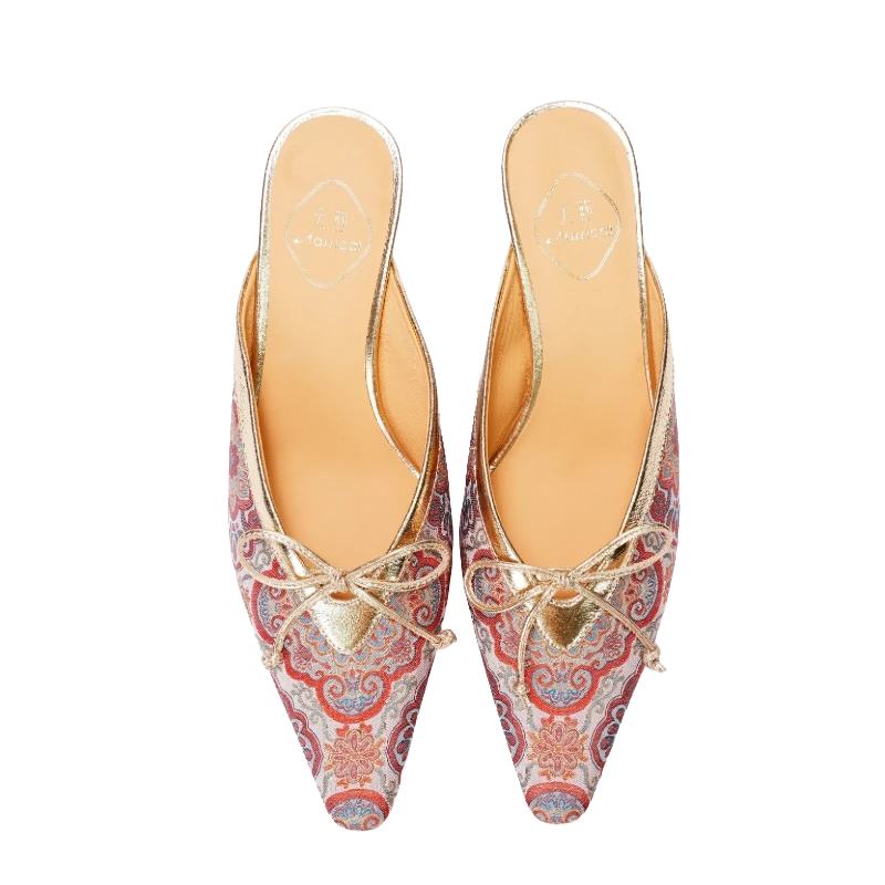 Transparent top view of Luxury Song Brocade Auspicious Bloom kitten heel mules for women featuring red and blue brocade patterns, gold accents, pointed toes, bow details, and elegant Chinese craftsmanship.