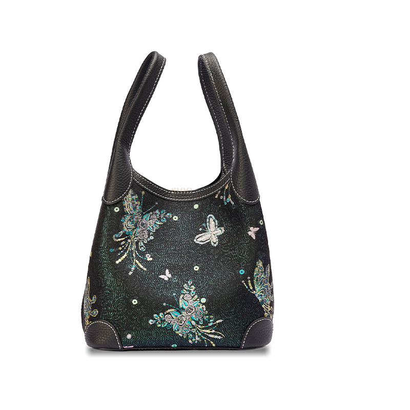 Front view of the Luxury Song Brocade Butterfly & Pearl Leather Basket Tote Bag, featuring a black brocade body with butterfly motifs and pearl-inspired accents.