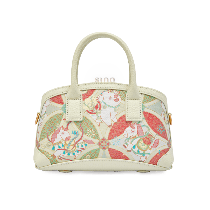 Front view of the Luxury Song Brocade Enduring Prosperity Leather Top Handle Bag featuring a pastel brocade pattern and elegant leather trim.