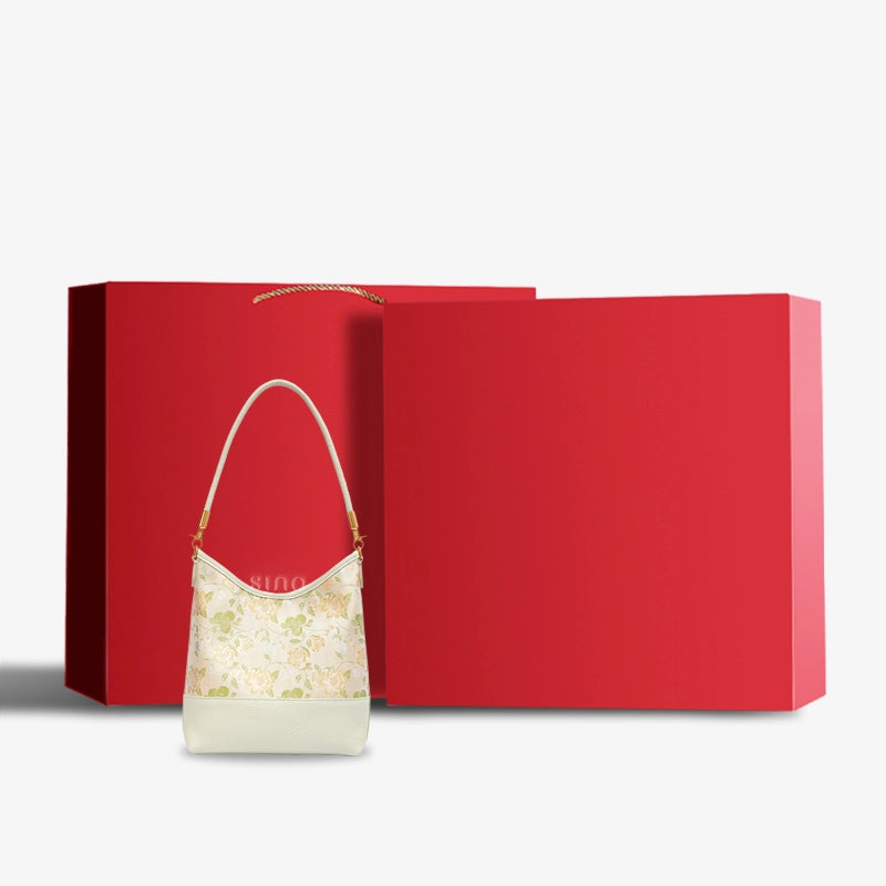 Luxury Jasmine Green Plum Song Brocade shoulder bag presented with an elegant red gift box.
