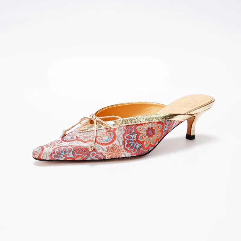 Single side profile of Auspicious Bloom Song Brocade mule shoes with pointed toe silhouette.