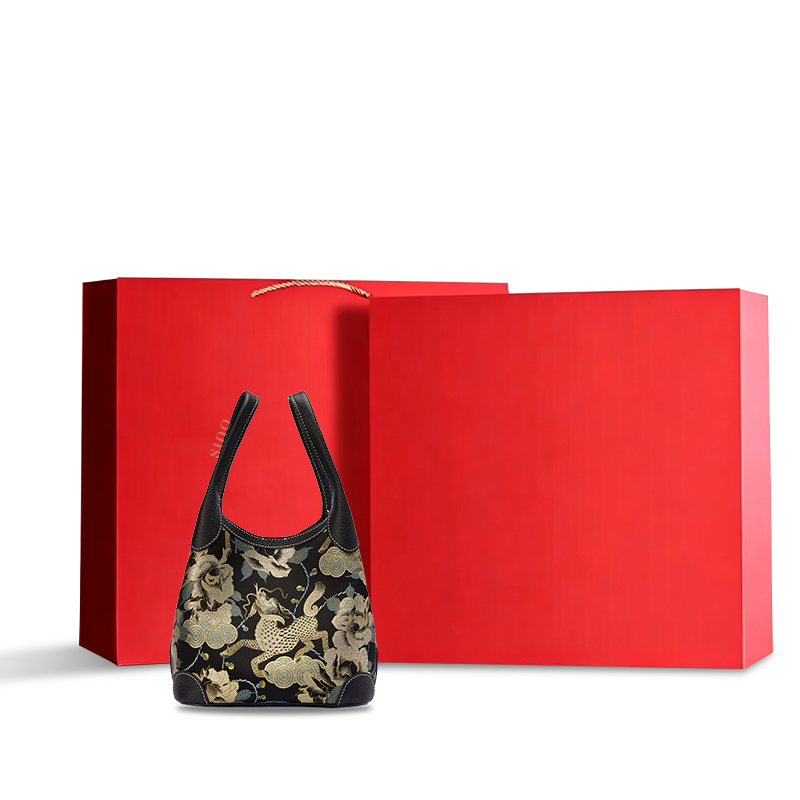 Luxury red gift box packaging of Song Brocade Qilin peony leather basket tote bag, ideal for premium gifting and retail presentation.
