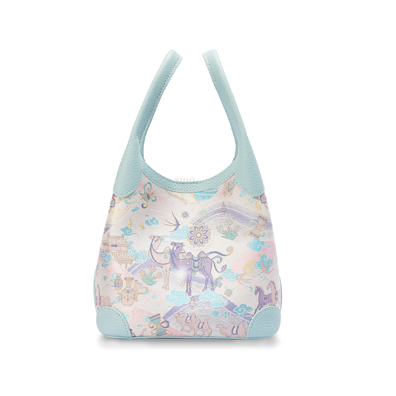 Front view of the Chinoiserie Luxury Song Brocade Silk Road Leather Basket Tote Bag, featuring a pastel Silk Road motif with camel, horse, cloud, and floral elements.
