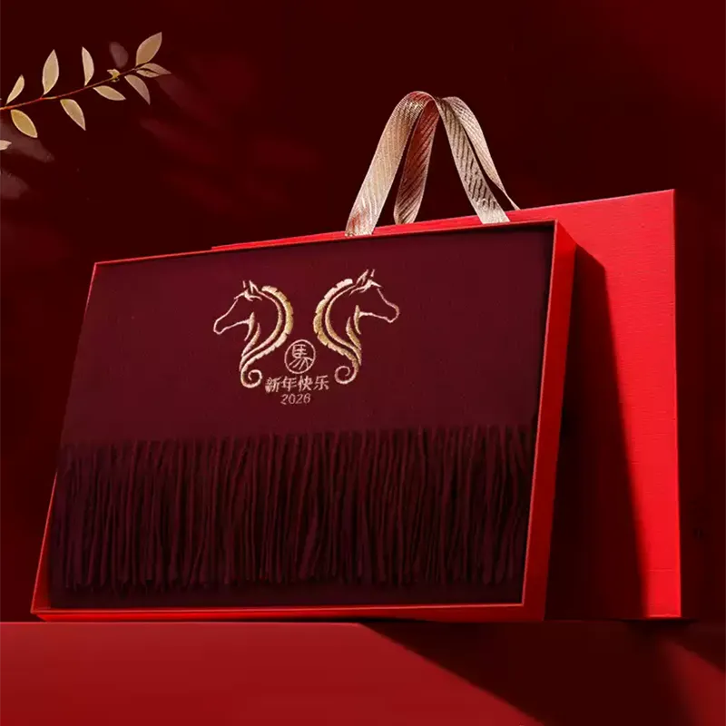 Premium red gift box with gold foil logo, containing the embroidered Horse Year wool cashmere scarf.