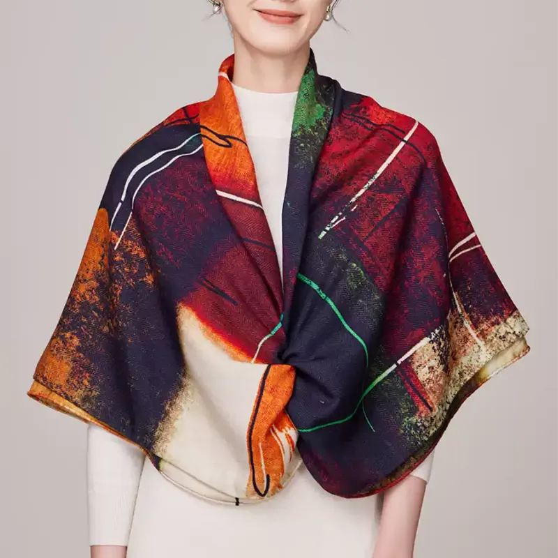 Model wearing red chromatic autumn scarf with clip fastening.