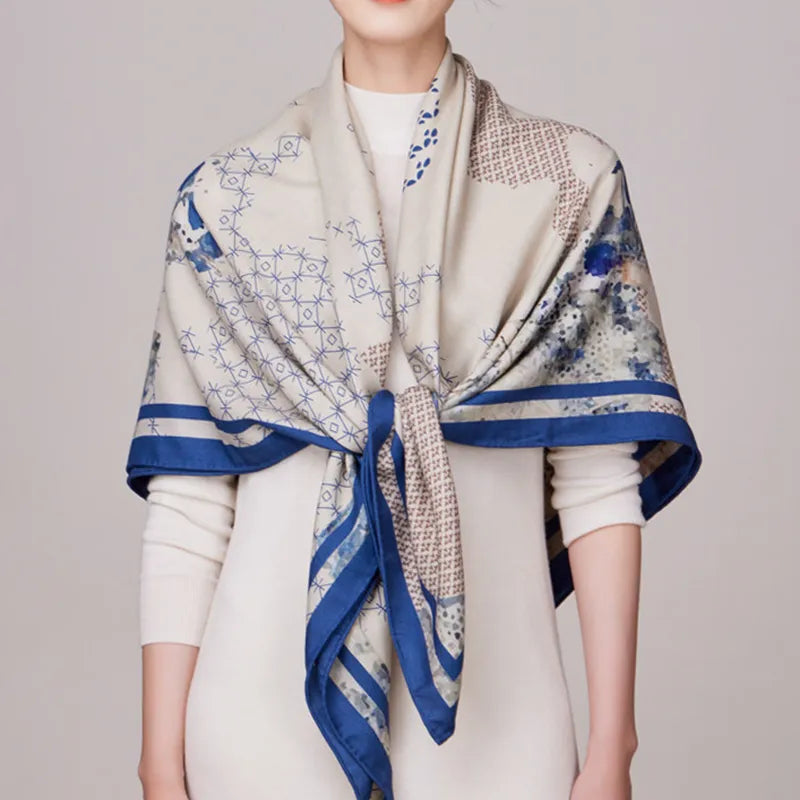 Luxury scarf with Peaks in Time design knotted at model chest.