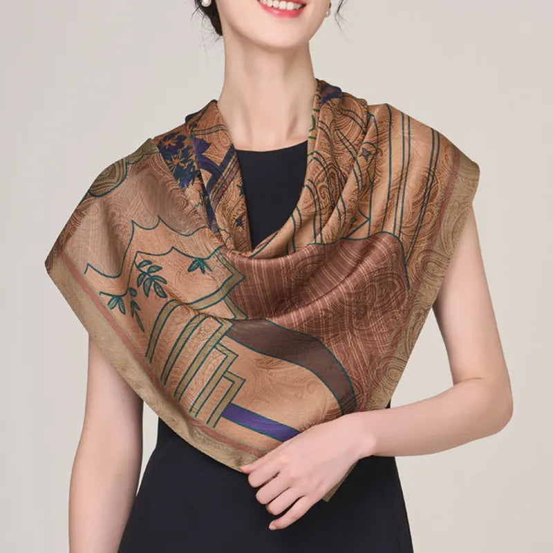 Chinese silk scarf draped in triangle at model shoulder.