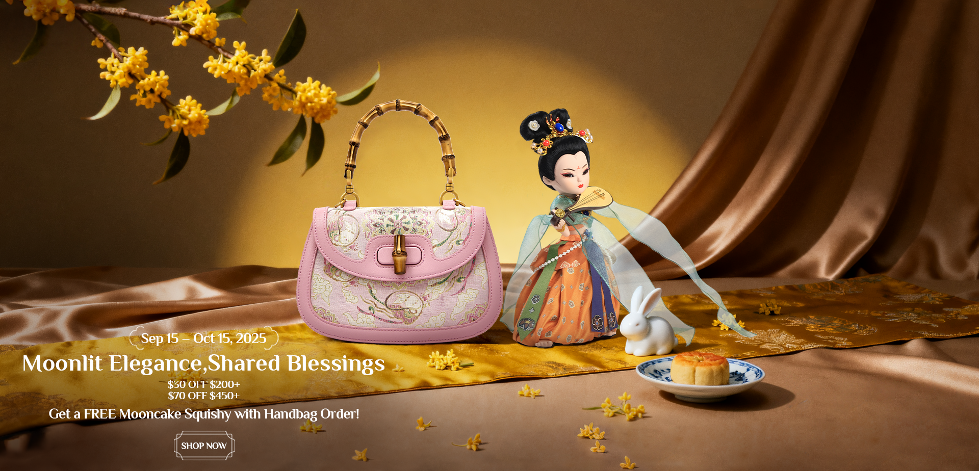 Traditional Dunhuang Flying Apsara doll in embroidered attire beside a pink bamboo-handle bag, with osmanthus flowers, a white rabbit, and a mooncake. Mid-Autumn discounts (Sep 15-Oct 15: $50 OFF $200+, $70 OFF $450+) + free mooncake squishy with handbag orders.