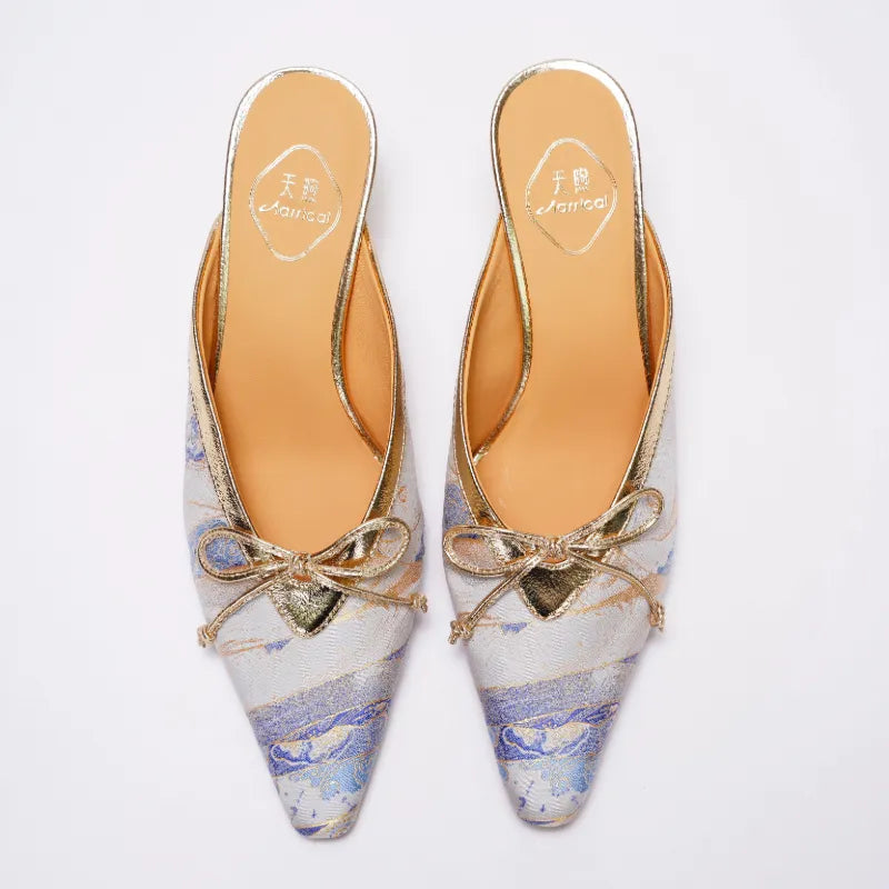 Moonlit Splendor Song Brocade pattern detail with delicate woven texture and Chinese textile artistry.