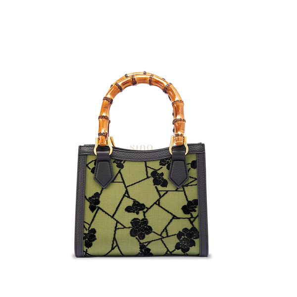 Mulberry silk Cracked Ice Plum Blossom motif leather bamboo handle handbag featuring traditional Chinese Zhangrong Silk Velvet craftsmanship.