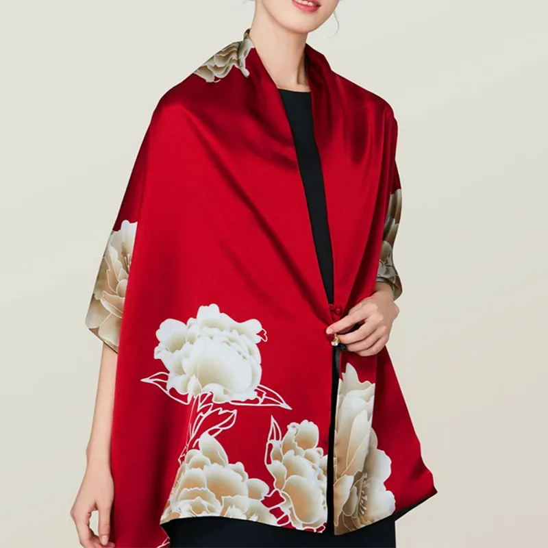 100% Mulberry Silk Long Scarf with Luxurious Peony - Model wearing buttoned shawl (side view).