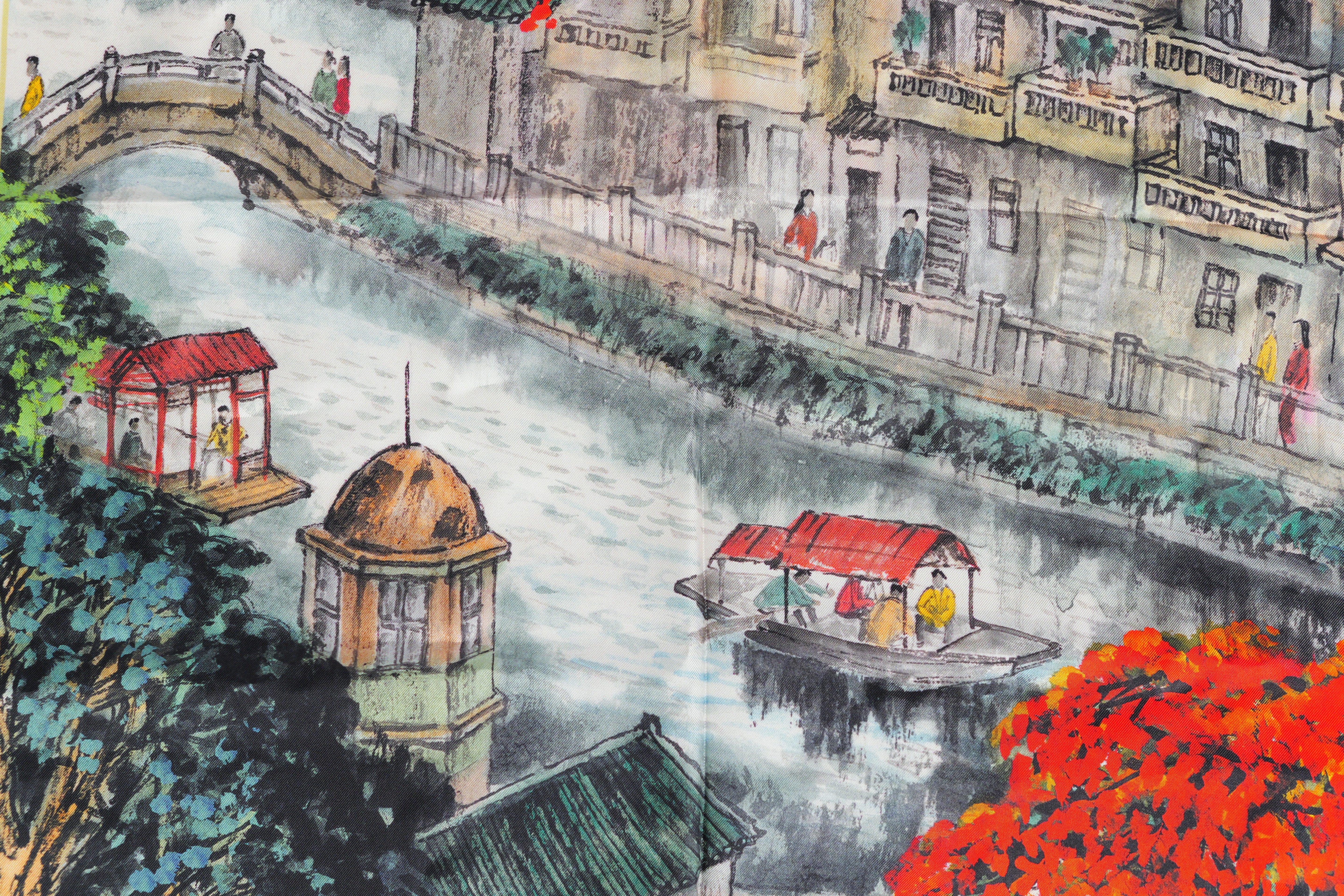 Mulberry silk texture and drape: luminous ivory fabric with soft sheen, highlighting the scarf's elegance as a luxury accessory.