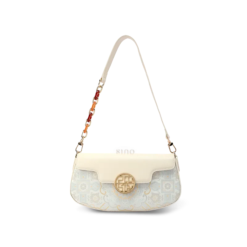 White octagonal brocade shoulder bag with gradient pattern.