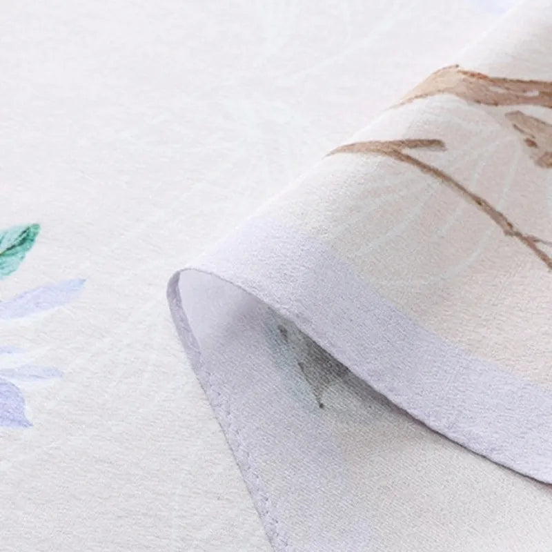 Close-up of the finely finished rolled edge on the Poetic Blossom Mulberry Silk Long Scarf for a neat and refined finish.