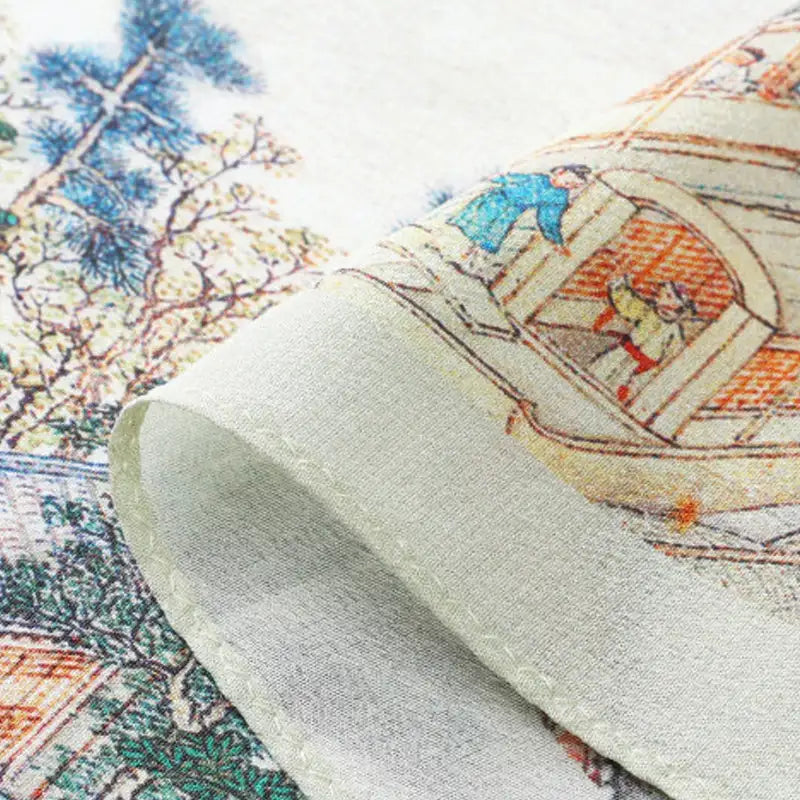 Close-up of 12 momme mulberry silk fabric featuring detailed Suzhou boat, pavilion and landscape motifs.