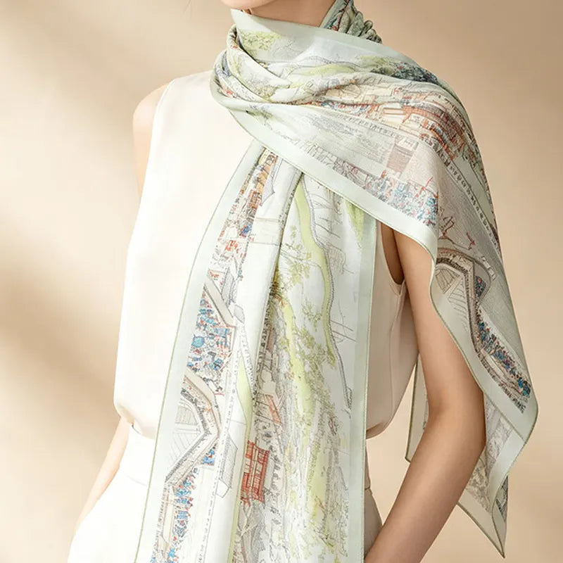 Woman wearing the Chinese Prosperous Suzhou Mulberry Silk Long Scarf draped around the neck and shoulders.