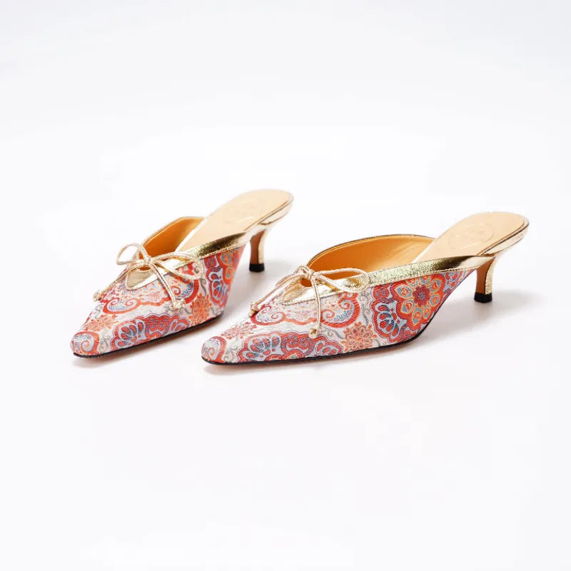 Pair of red Song Brocade Auspicious Bloom kitten heel mules featuring traditional Chinese floral patterns.