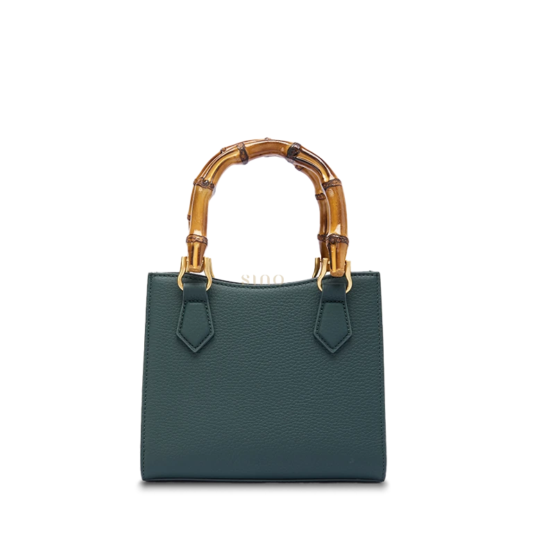 Back view of Shu Brocade Panda bamboo handle handbag with smooth leather finish and elegant structured design.