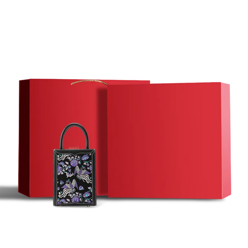 Premium red gift box containing the Shu Brocade tote bag.