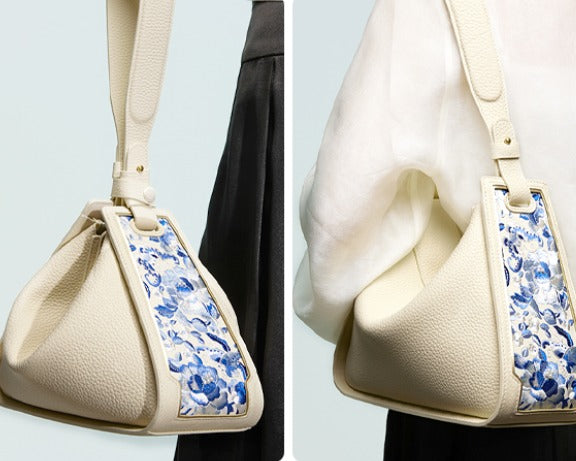 Two side views of a cream SANLAN embroidered shoulder bag showing its convertible Zongzi-inspired silhouette.